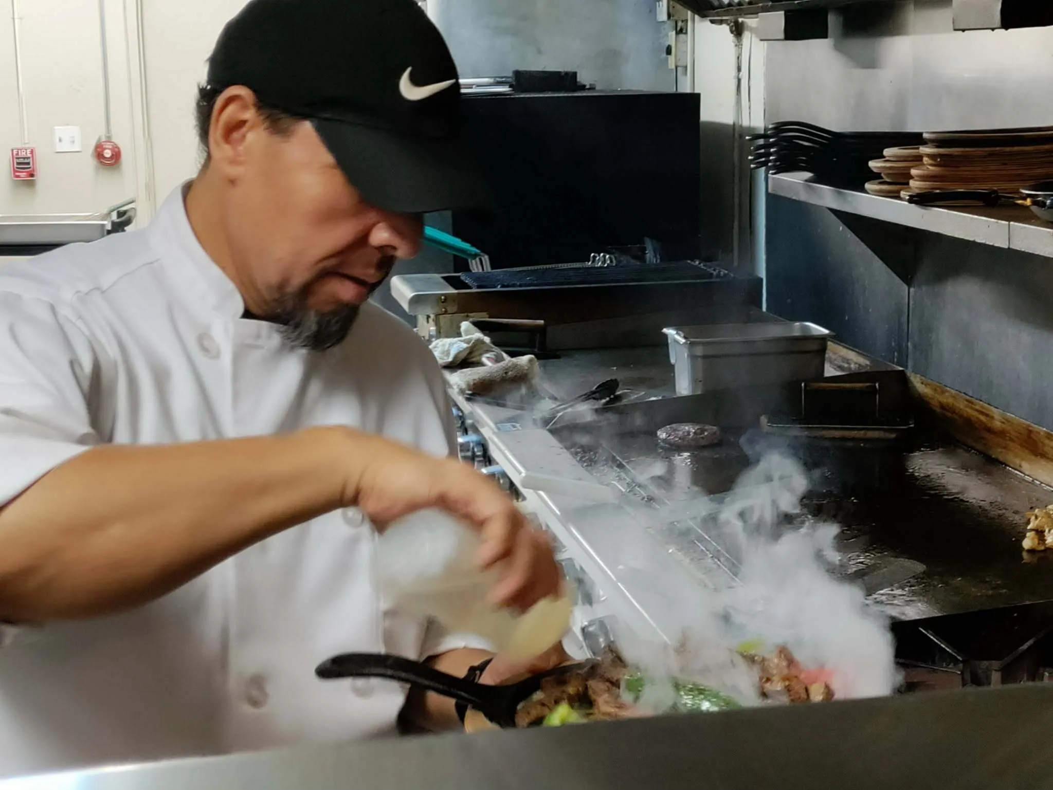 EXHIBIT H · OWNER/CHEF MAKING IT HAPPEN